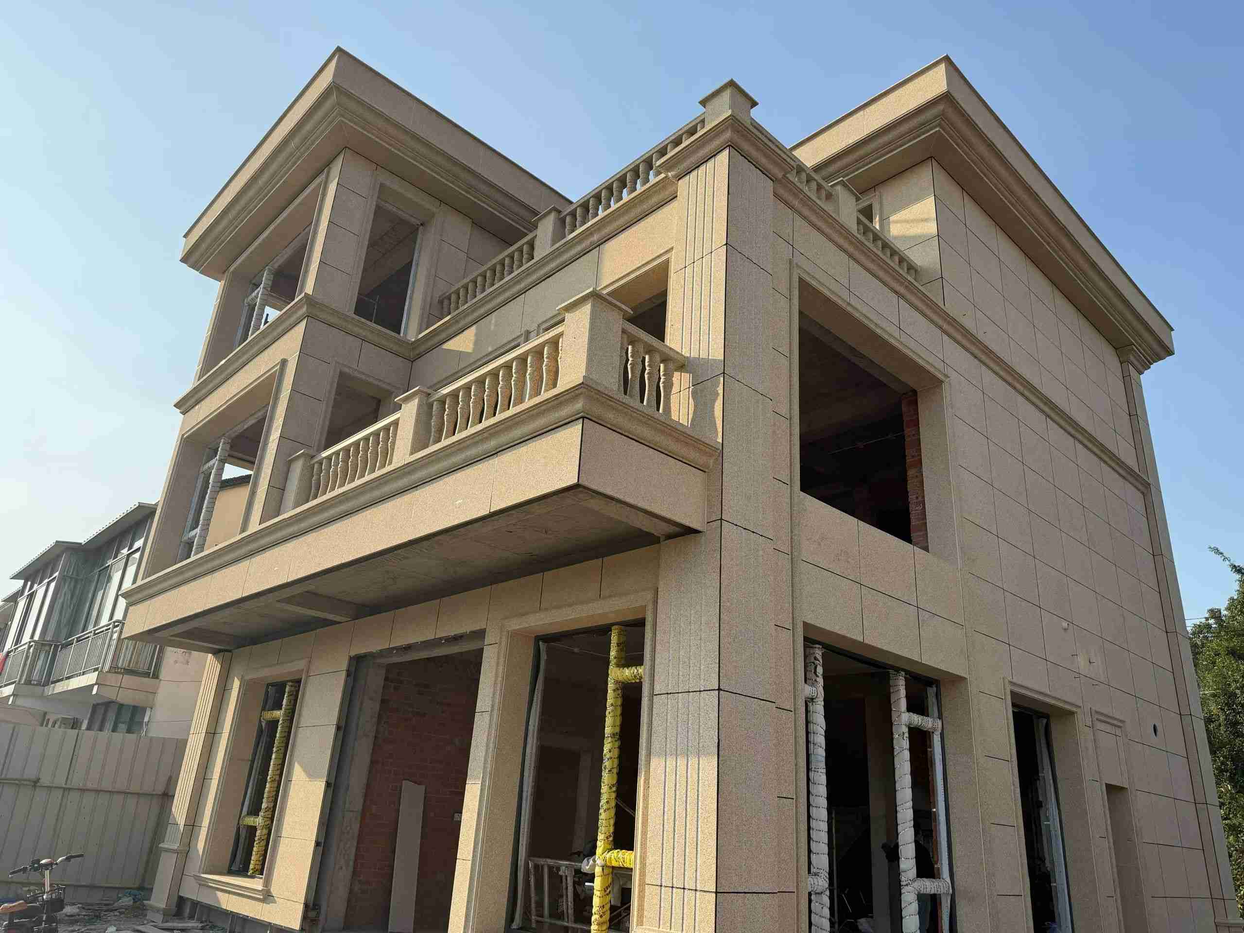 石家庄 黄金麻花岗岩石材荔枝面外墙干挂效果展示